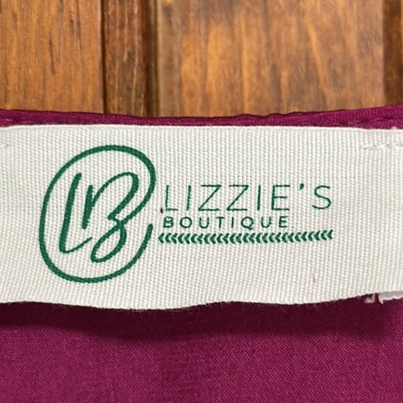 Lizzie’s Boutique Purple Crisscross VNeck with Dropped Sleeve/Rolled Hem Large - Picture 7 of 8